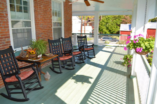 Upper Veranda porch on the southern side of Azalea Manor Bed and Breakfast in Madison Historic District, downtown Madison Indiana 47250