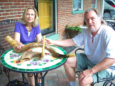 James & Carla Barbarossa with a Shofar, a rams horn used in Jewish religious ceremonies.